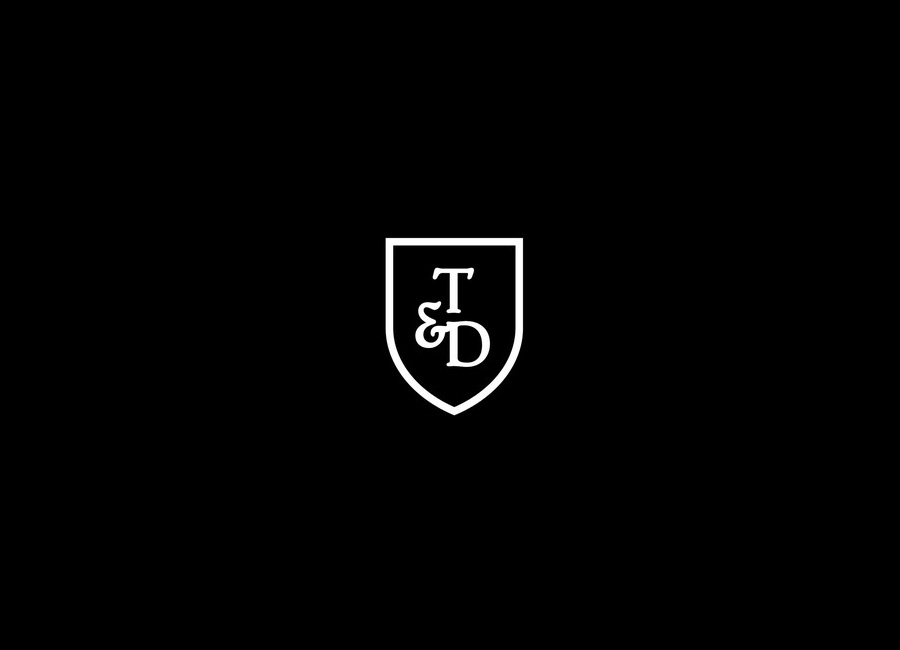 Shield monogram for male skincare and accessory range Triumph & Disaster designed by DDMMYY