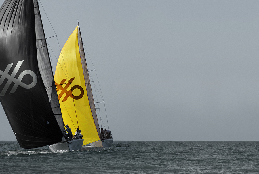 Crosskey logo across boat sails designed by Kurppa Hosk