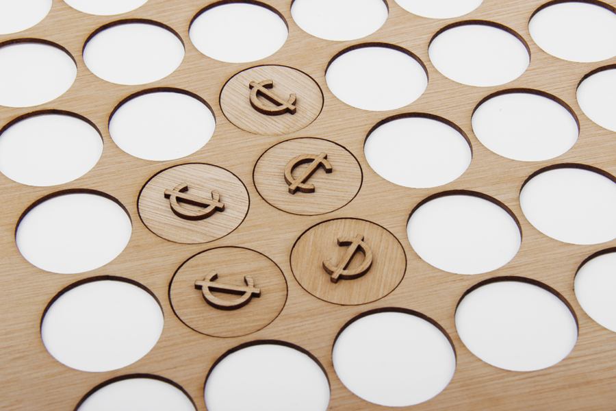 Wooden tokens for craft retail site Cheap Labor designed by Sciencewerk