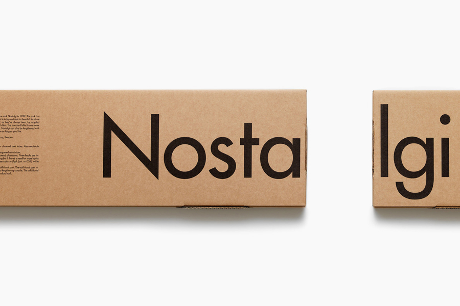 Packaging with black ink across an unbleached board designed by Bedow for hat and shoe rack Nostalgi from manufacturer Essem