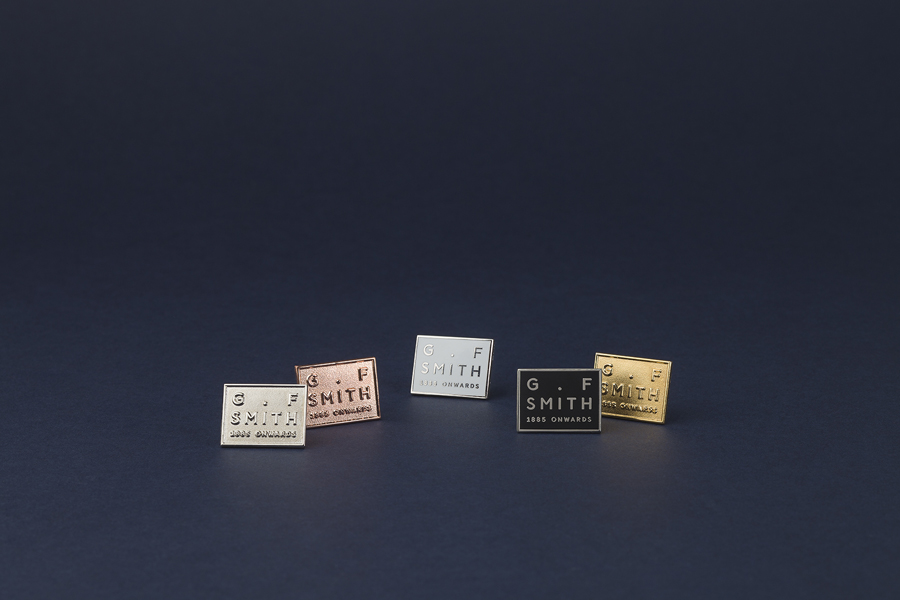 Metal pin badges designed by Made Thought for British paper merchant G . F Smith