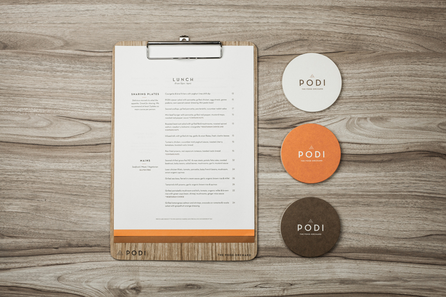 Logotype, menu and coasters designed by Bravo Company for Singapore-based organic restaurant Podi