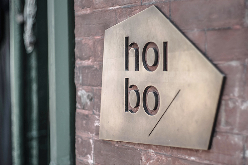 Singage designed by Blok for luxury bag, clothing and accessories brand Hoi Bo