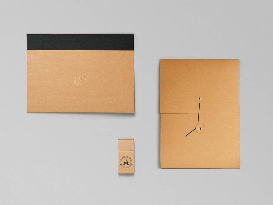 Logo and stationery design with gold foil detail designed by Bleed for the redevelopment of Oslo waterside district Aker Brygge