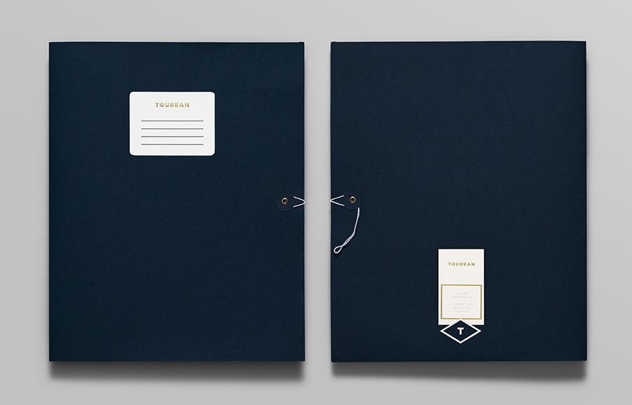 Logotype and folder with gold foil and sticker detail for British multinational venture capital firm Tourean designed by Anagrama 