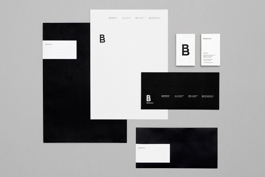 Logo and monochromatic stationery for renovation and carpentry specialists Born Builders designed by The Drop Studio