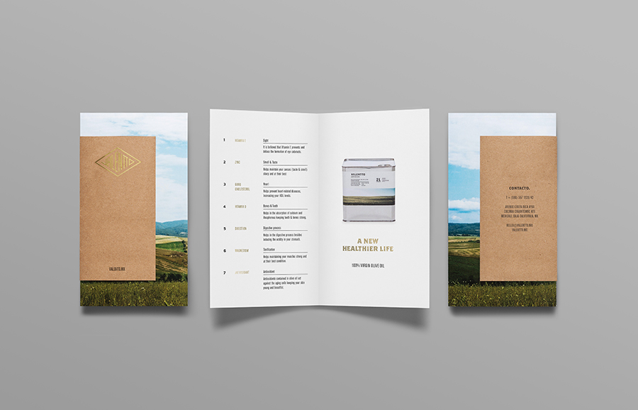 Logo and pamphlet with gold foil, photographic landscape and unbleached material detail designed by Anagrama for olive oil brand Valentto