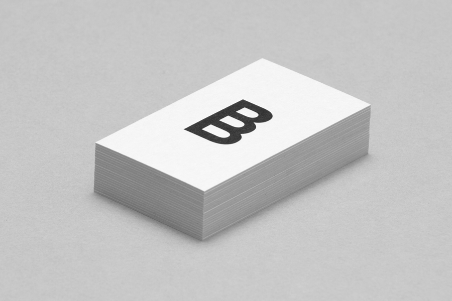 Logo and monochromatic business card for renovation and carpentry specialists Born Builders designed by The Drop Studio
