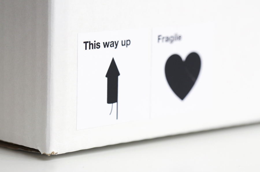 Logo and parcel label with bold icon detail created by Designers Anonymous