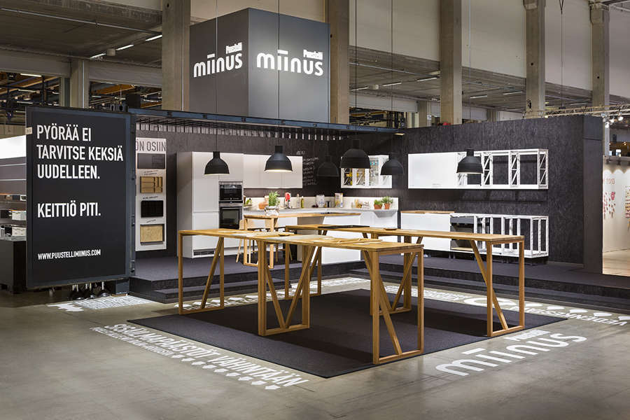 Exhibition graphics designed by Bond for Puustilli's new reductionist kitchen Miinus