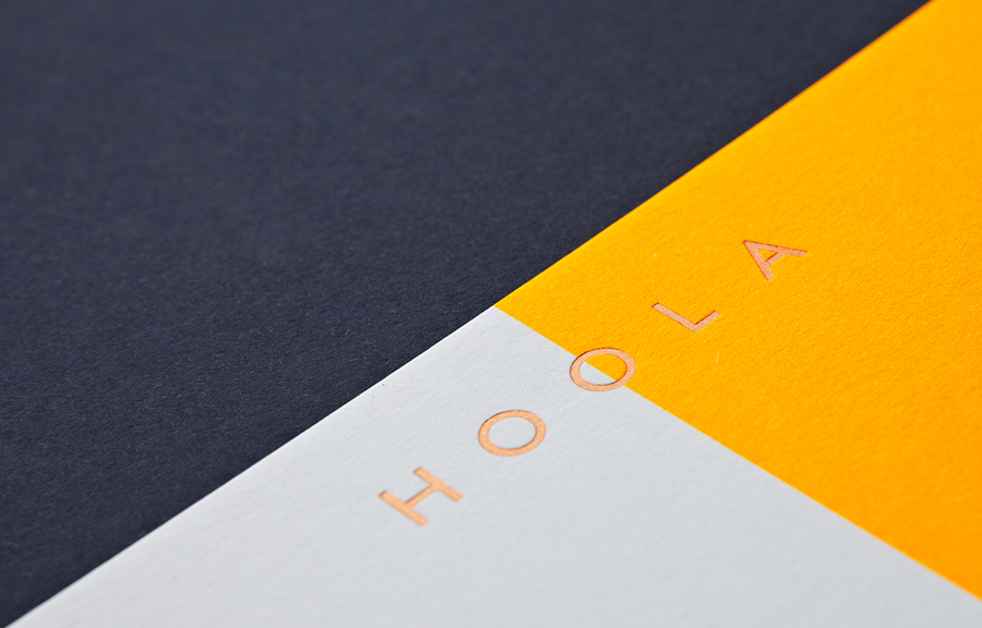 Logotype and business card with fluorescent ink and bronze foil designed by Two Times Elliott for women's swimwear brand Hoola 