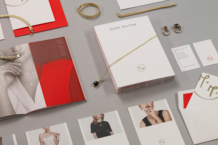 Logo, stationery and print with a gold and red spot colour detail designed by ico for jewellery brand Mark Milton