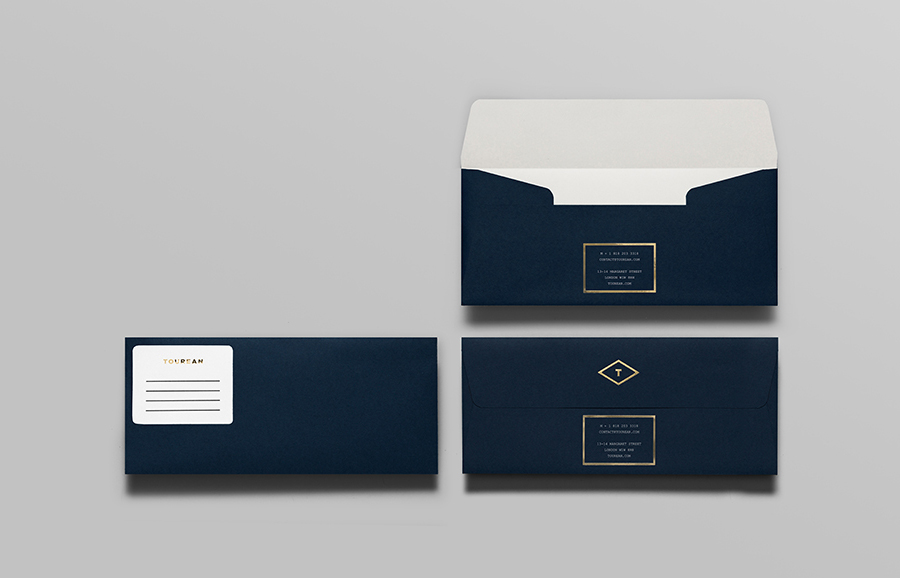 Envelope with gold foil detail for British multinational venture capital firm Tourean designed by Anagrama 