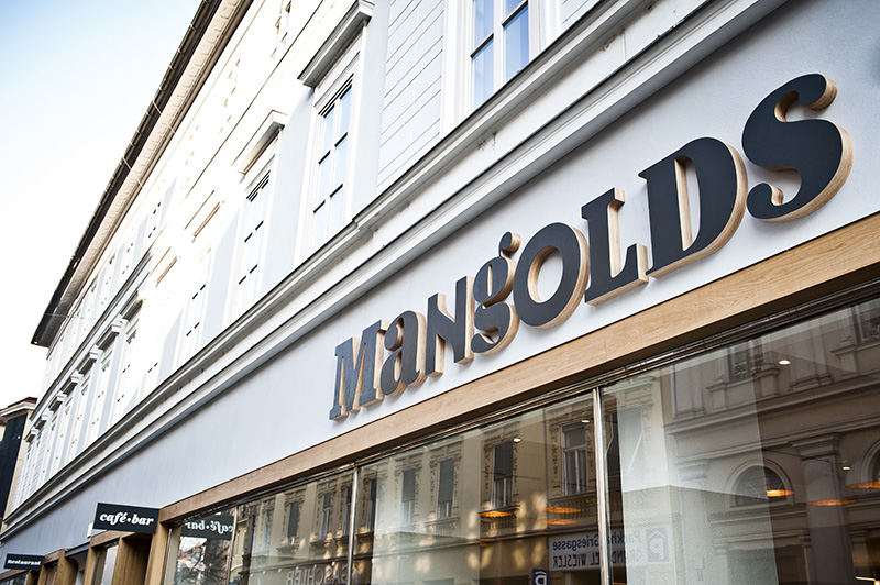 Logotype and exterior signage created by Moodley for Austrian vegetarian and wholefood restaurant Mangolds