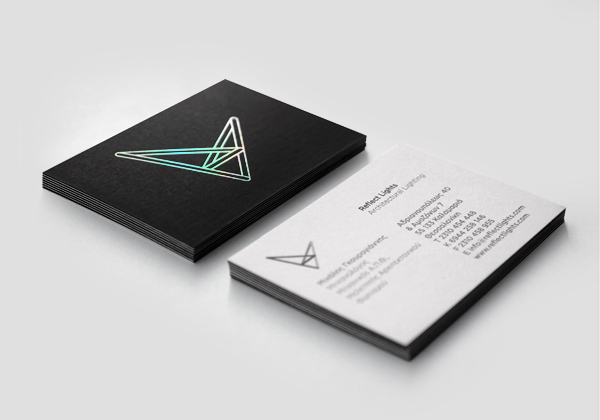 Logo and business card with holographic foil detail designed by Designers United for architectural lighting firm Reflect Lights