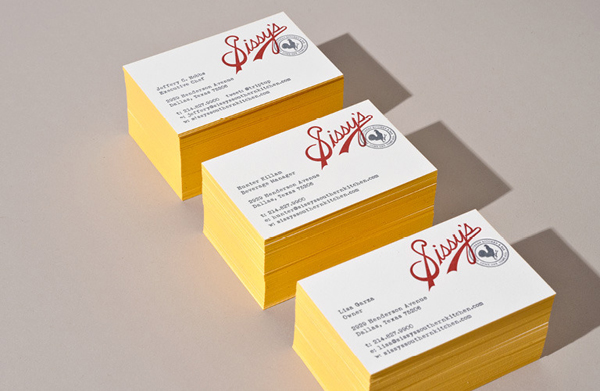 Logotype and yellow edge painted letterpress business cards designed by Tractorbeam for Sissy's Southern Kitchen