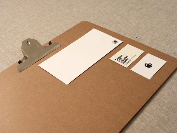 Logo and stationery with unbleached paper detail designed by and for independent graphic design studio Carbon Loft