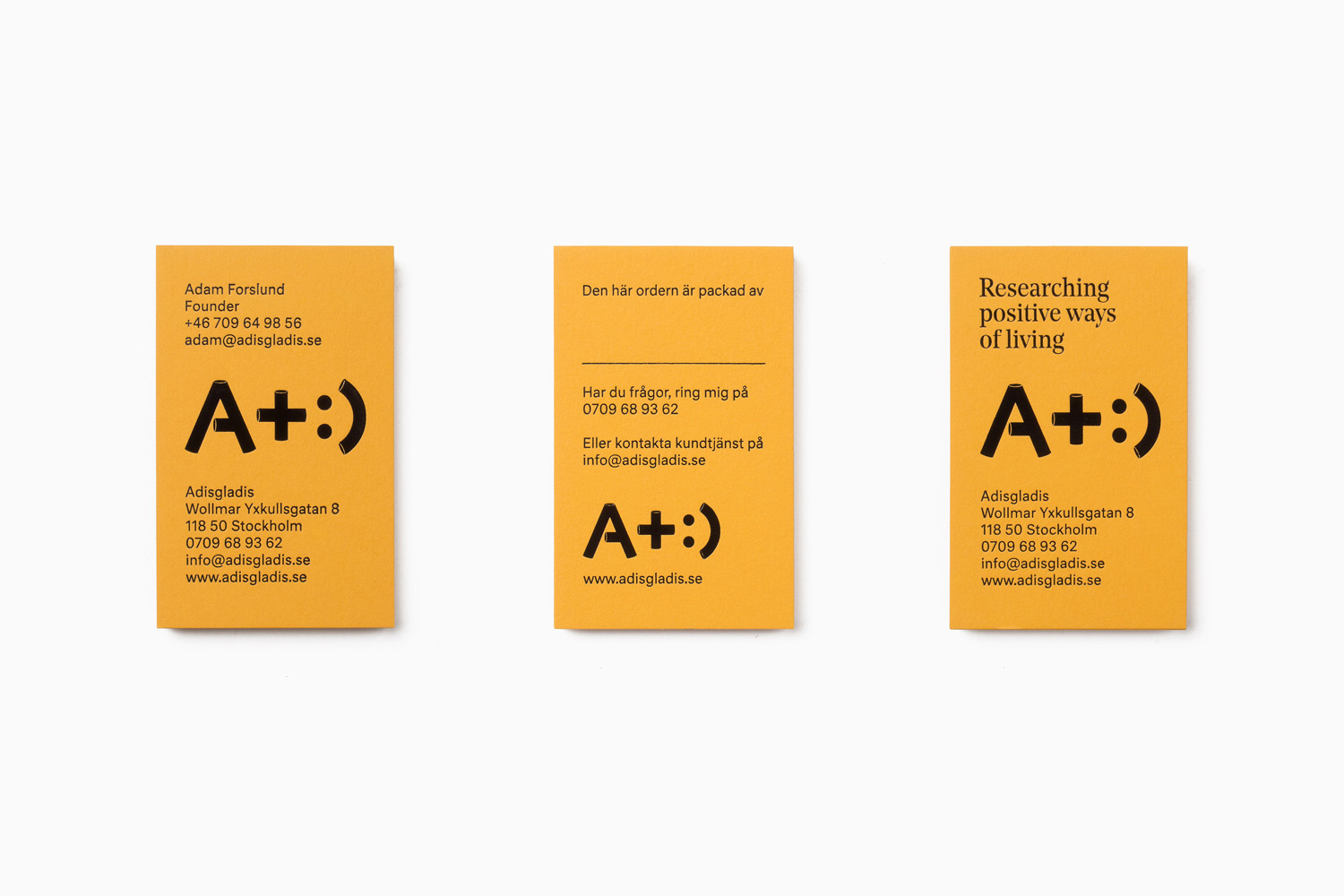 Yellow business cards for clothing and gadget retailer Adisgladis designed by Bedow
