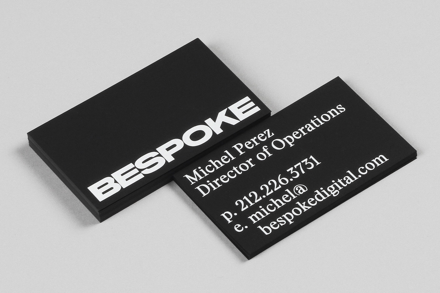 Brand identity, custom typeface and business cards by New York based DIA for boutique retouching business Bespoke