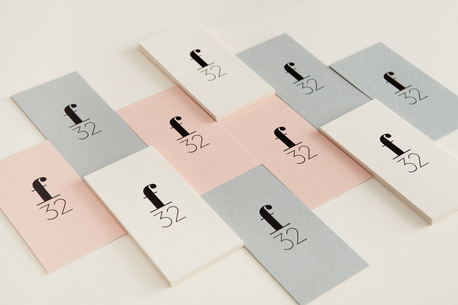Pastel coloured and black block foiled business cards for trend watching company f32 designed by Blok