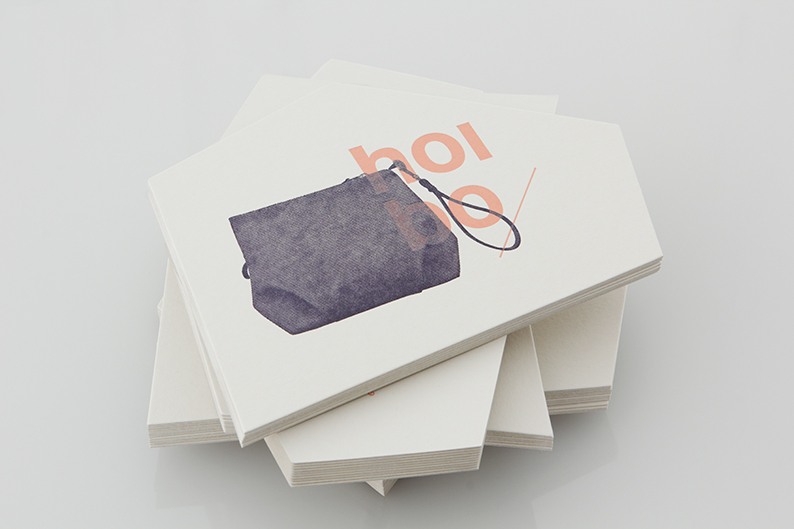 Logo and print with angular die cut detail designed by Blok for luxury bag, clothing and accessories brand Hoi Bo