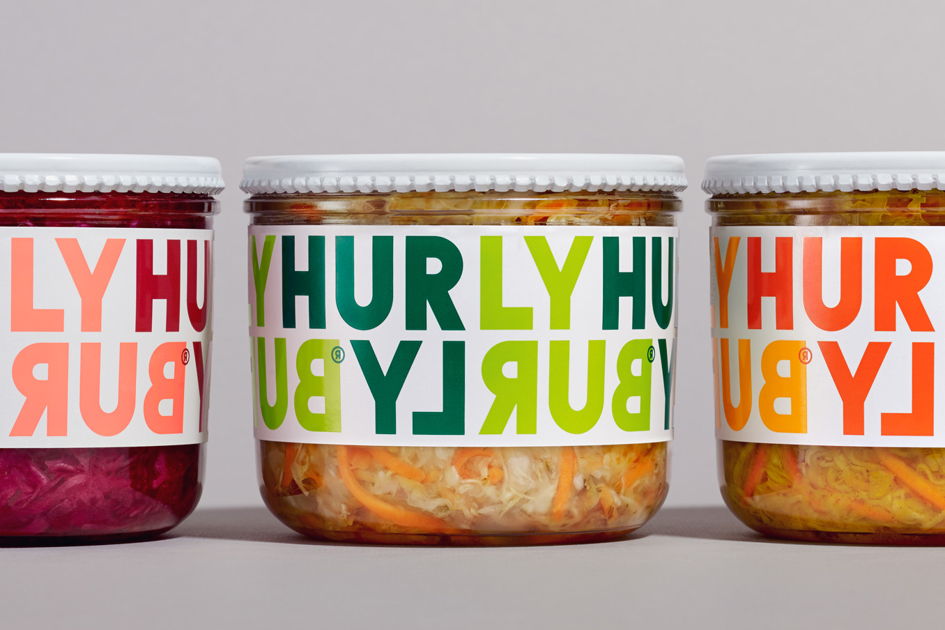 Packaging design by London-based Midday Studio for Hurly Burly and its range of raw slaw