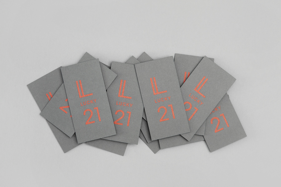 Grey board business card design for Lucky 21 by Blok