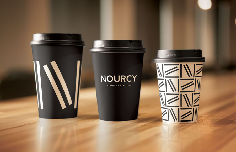 Branded coffee cups designed by lg2boutique for Quebec City delicatessen Nourcy