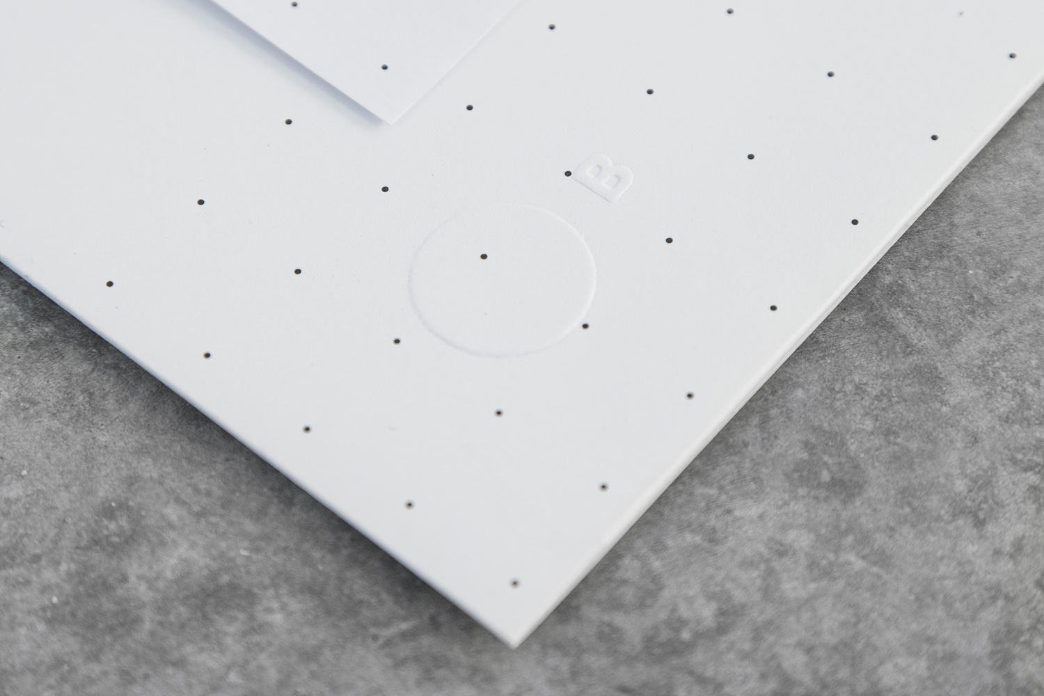 Brand identity and blind embossed stationery for Mexican architecture studio Obra Blanca designed by Savvy