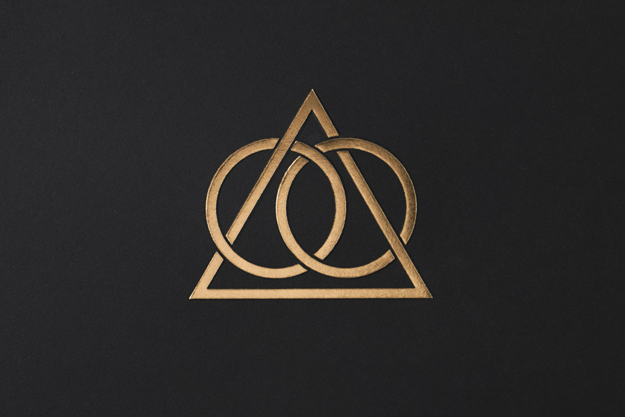 Foiled logo for Ten Trinity Square designed by Pentagram