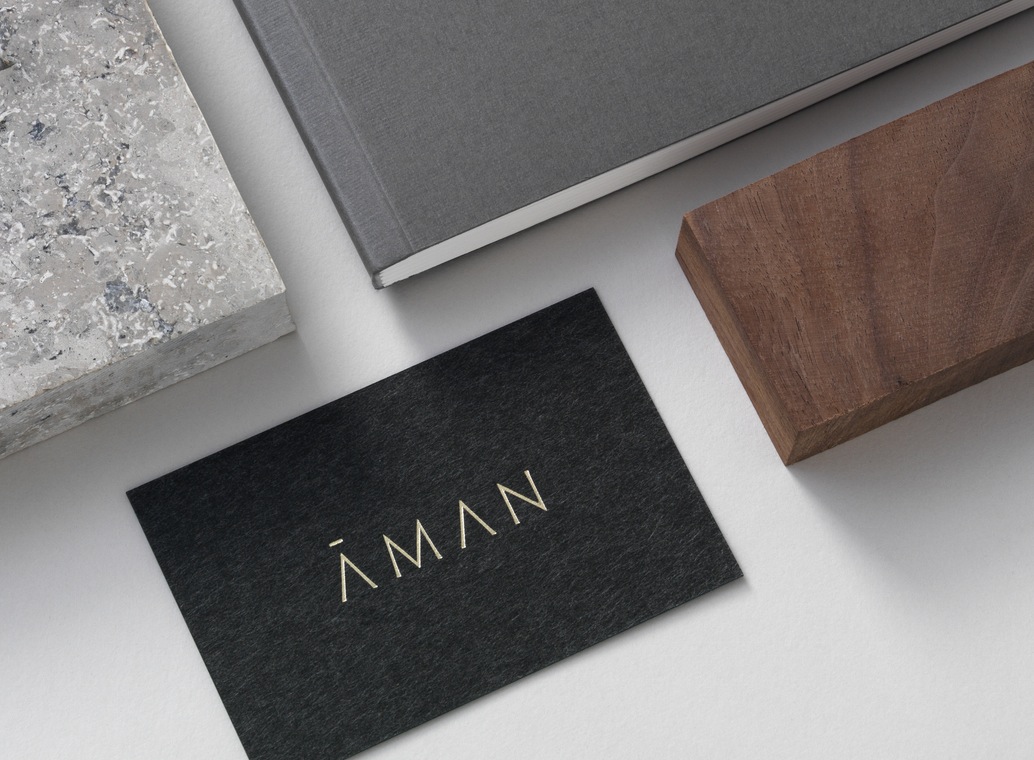 Brand identity and gold foil business card for luxury resort business Aman by Construct, United Kingdom