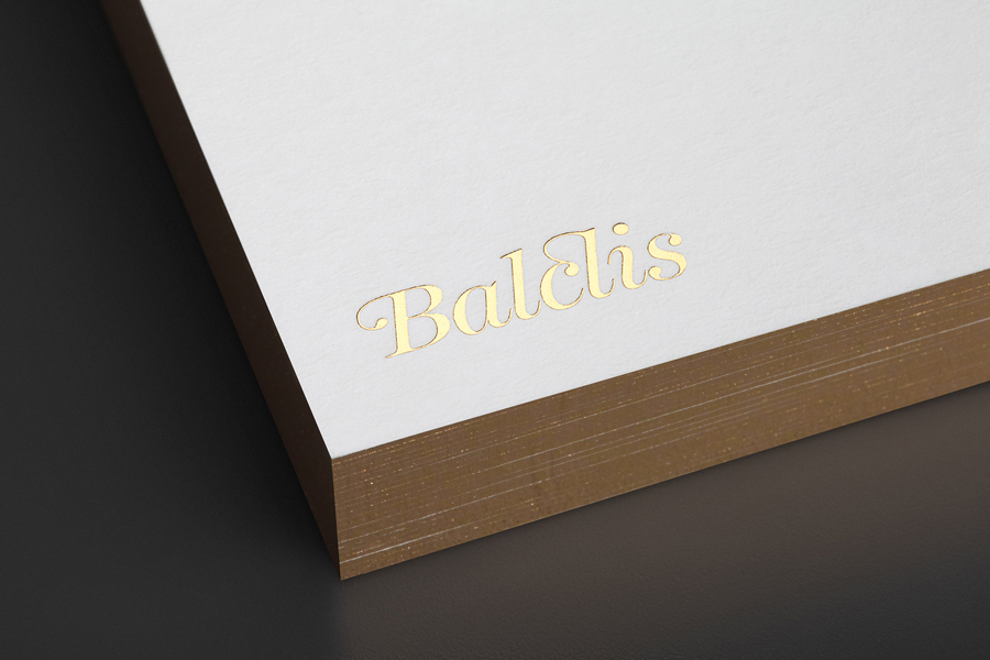 Gold foiled business card for auction house Balclis by Mucho