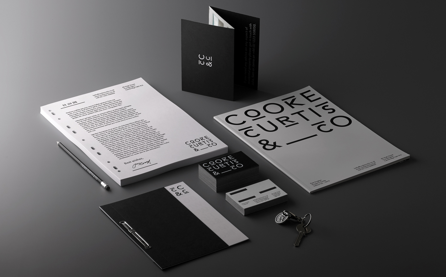 Brand identity, print and stationery for UK estate agent Cooke Curtis & Co. by graphic design studio The District, United Kingdom