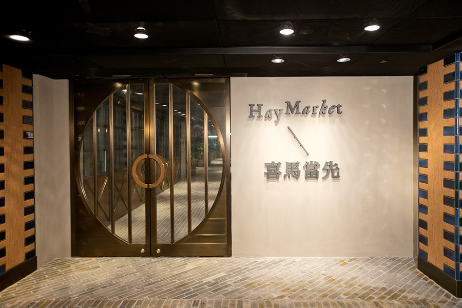 Interior and signage for Hong Kong restaurant Hay-Market designed by Foreign Policy