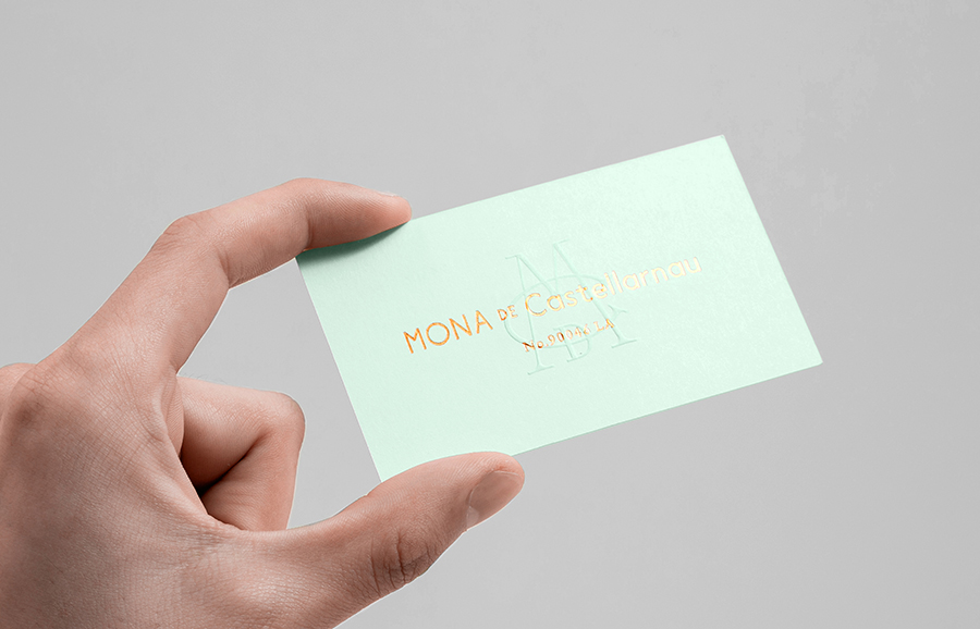 Gold foil and blind embossed business card for lifestyle brand Mona De Castellarnau by Anagrama