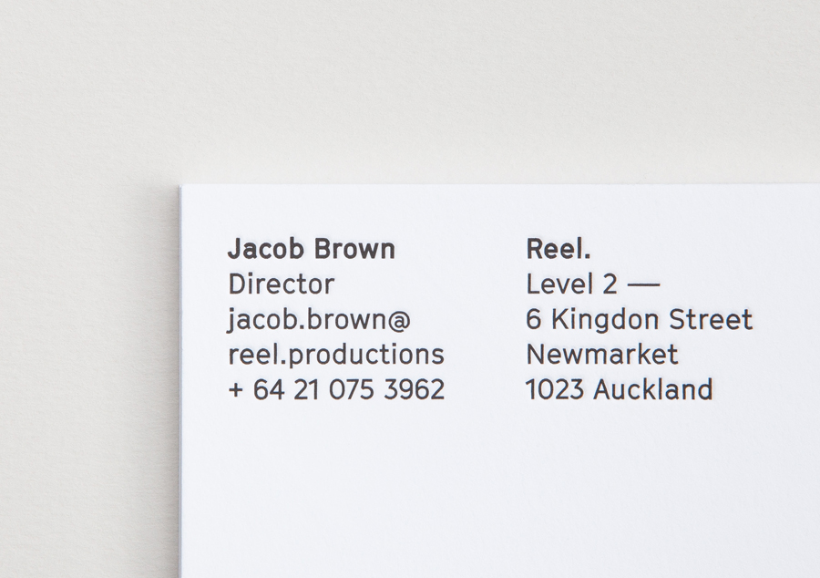 Letterpress business cards for Reel by graphic design studio Richards Partners