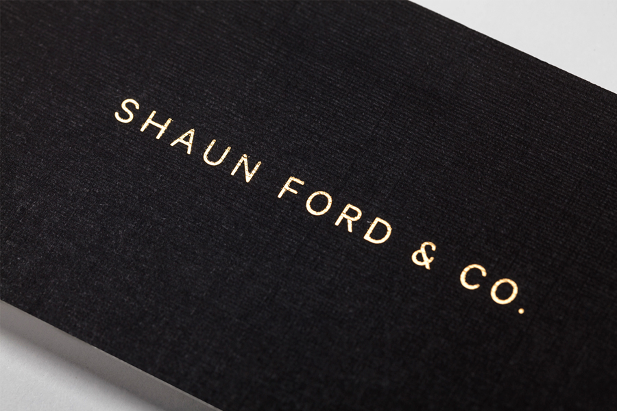 Logotype and business card with block foil detail designed by Savvy for bespoke furniture design firm Shaun Ford & Co. 