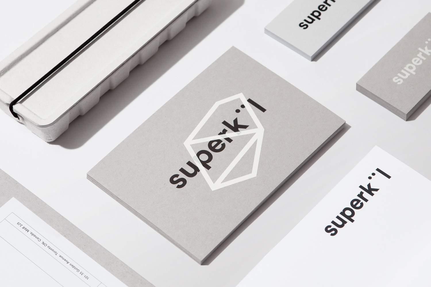 Brand identity and note card by Toronto-based graphic design studio Blok for Canadian architecture firm Superkül