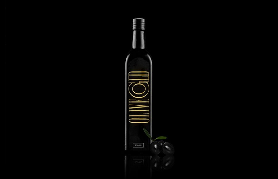 Logo and packaging designed by Anagrama for premium cold-pressed olive oil brand Olive Gold