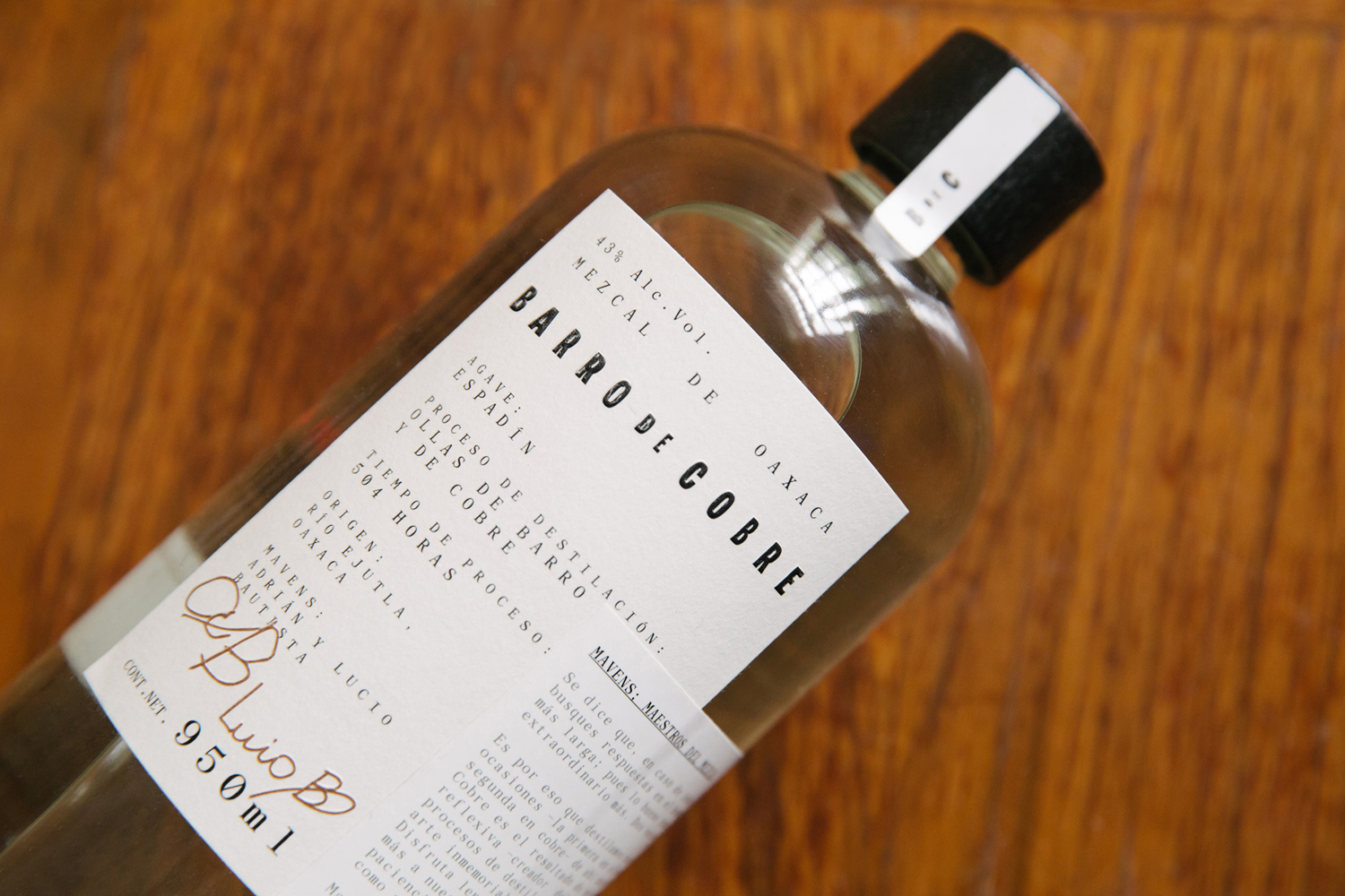 Branding and packaging by Mexican design studio Savvy for twice distilled mezcal Barro de Cobre