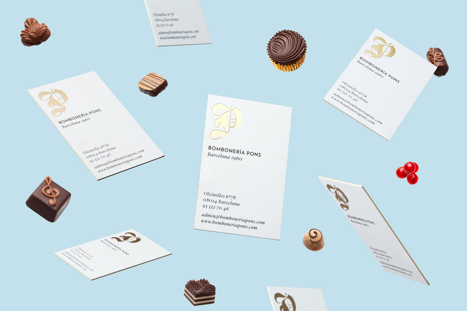 Brand identity and gold foiled and edge painted business cards for chocolatier and confectioner Bombonería Pons designed by Mucho