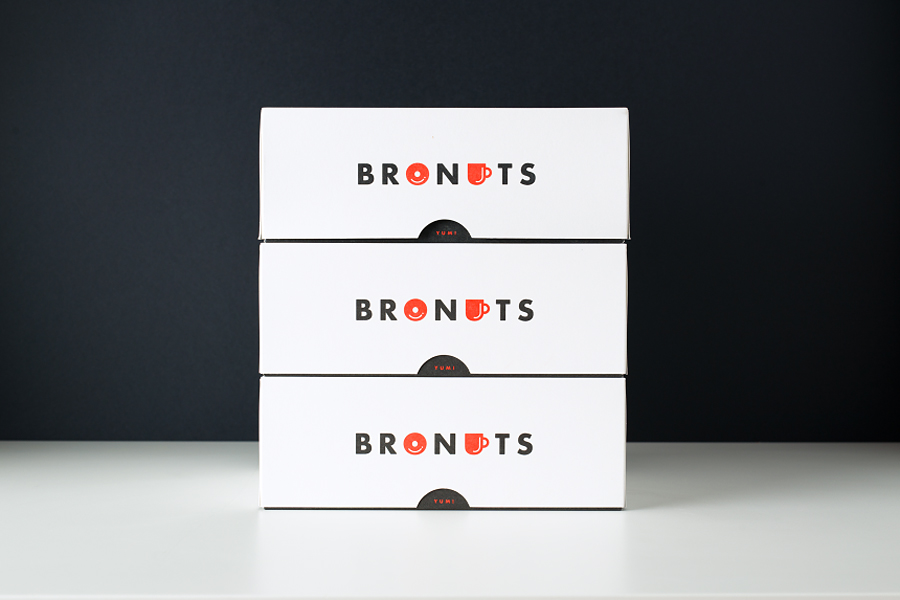 Visual identity and packaging for coffee and doughnut business Bronuts by Canadian graphic design studio One Plus One
