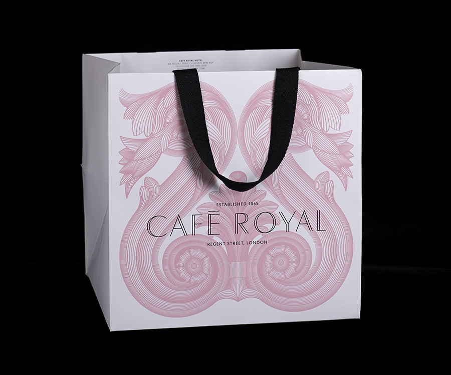 Carrier bag with illustrative detail for Cafe Royal designed by Pentagram