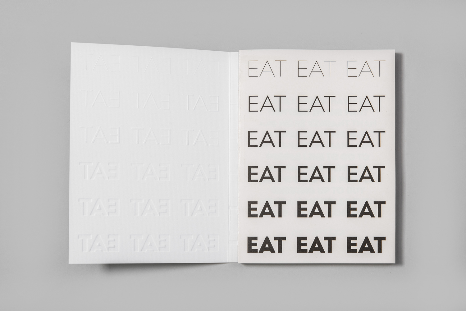 Logotype and print with blind emboss detail by Fable for EAT, the second installation of a two-year long series of exhibitions on Singapore's food culture