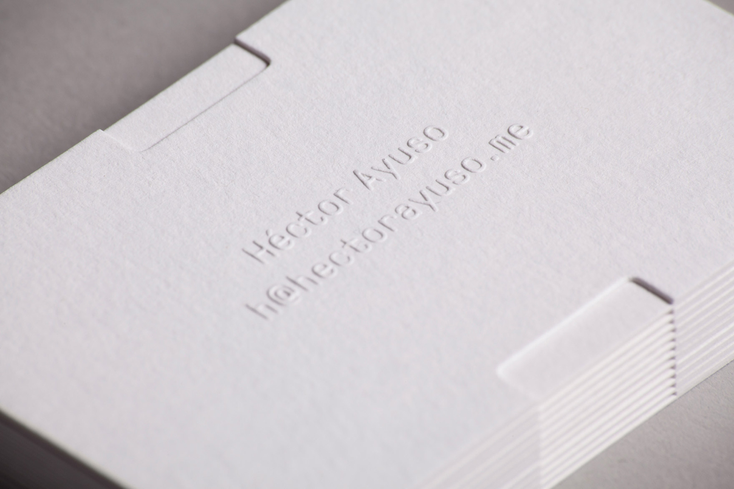 Blind emboss business card for Héctor Ayuso designed by Mucho