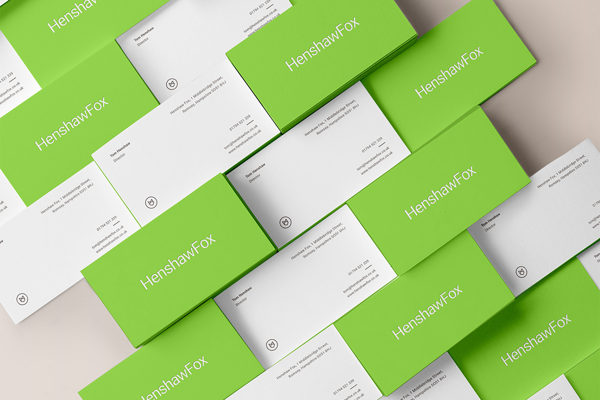 Brand identity and business card by British graphic design studio Parent for Hampshire estate agent HenshawFox. 