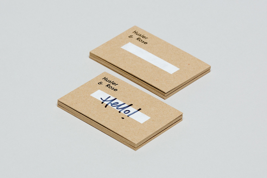 Uncoated, unbleached, white ink and black foiled business cards for Husler & Rose designed by Post