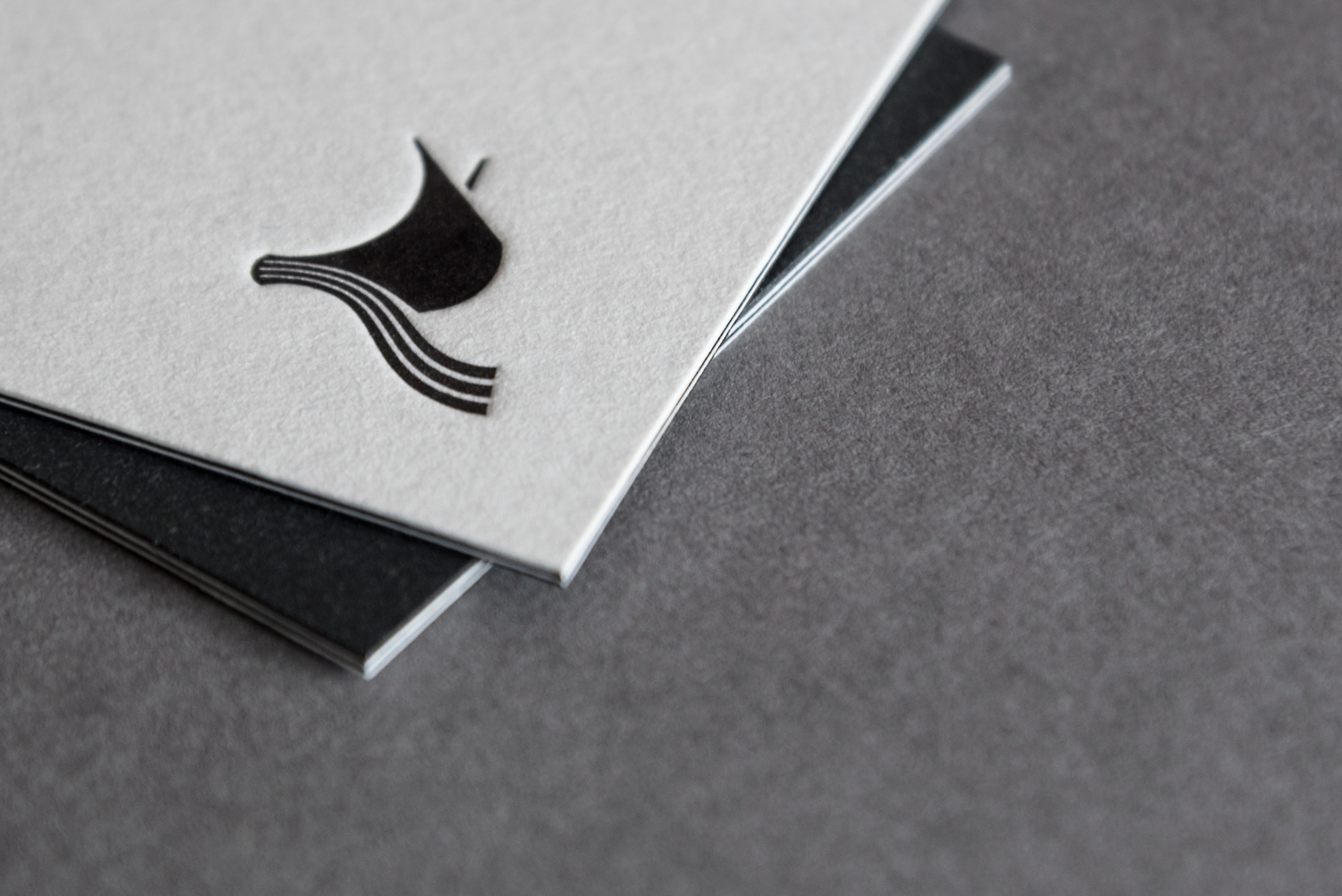 Logo and triplex business cards by London-based design studio, private press and typography workshop The Counter Press for UK independent publisher Rattis Books.