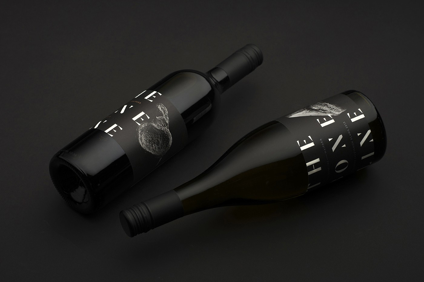 New wine labels with fossil photography and Dala Moa character detail by Inhouse for winery The Bone Line