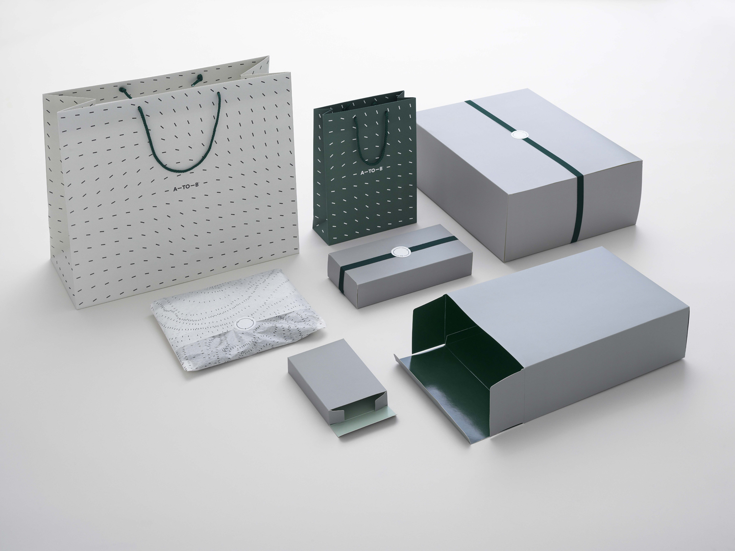 Brand identity, retail packaging and bags for Scandinavian retailer, bag and travel specialist A-TO-B by Stockholm Design Lab